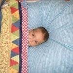 Kind im Bett